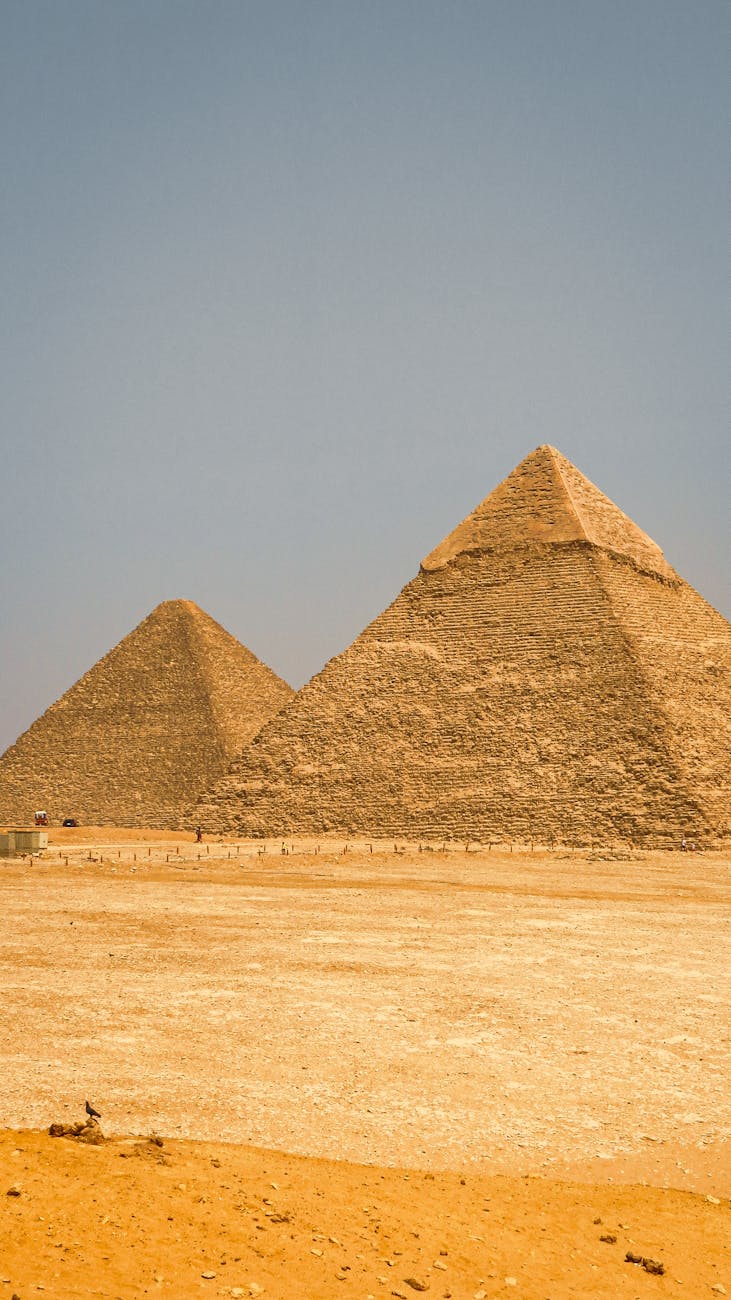 iconic pyramids of giza in egyptian desert